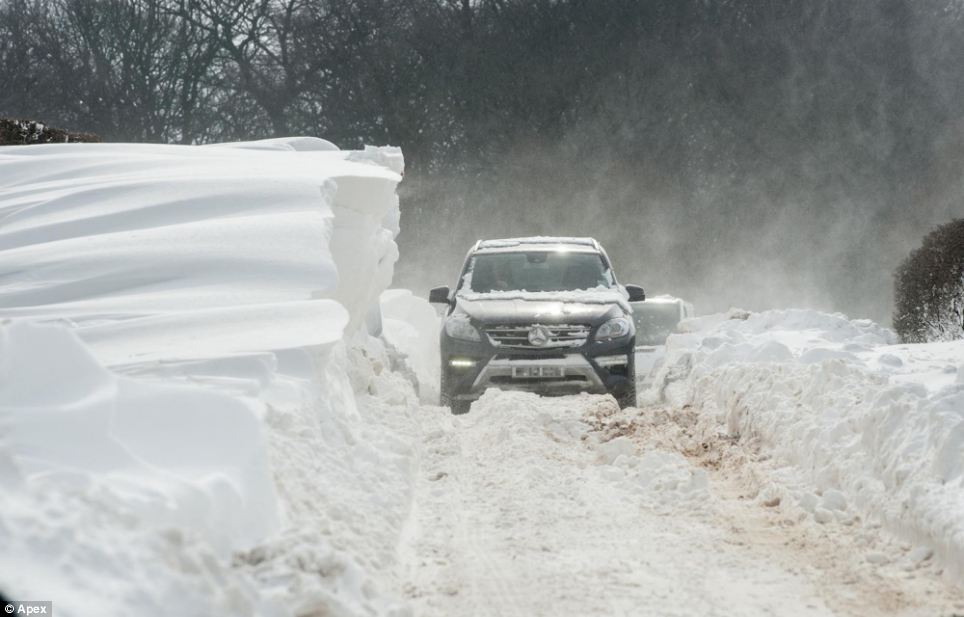 Walls of snow: High winds and snow along with freezing temperatures brought traffic chaos to rural parts of North West Lancashire today